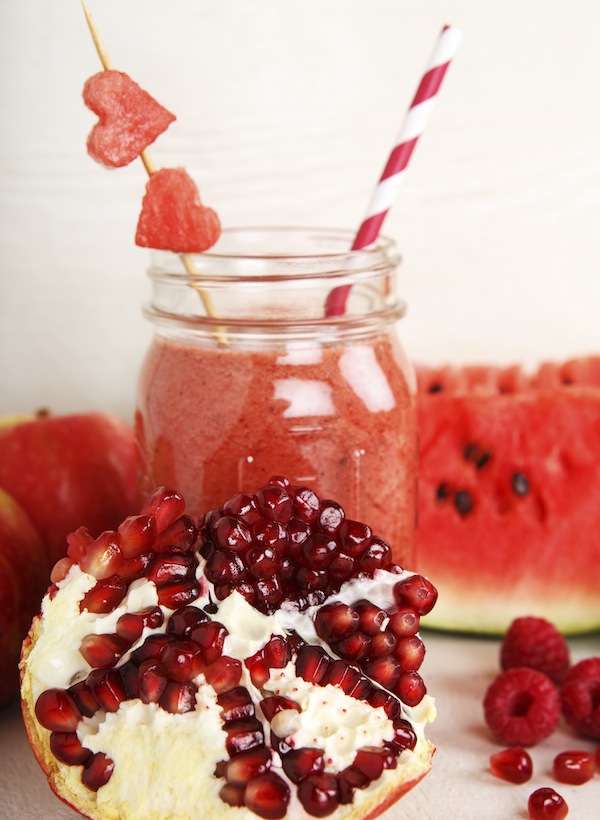 Fresh organic red smoothie with apple, watermelon, pomegranate,
